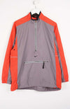 Gray and orange jacket with Nike logo on a white background