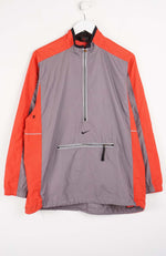 Gray and orange jacket with Nike logo on a white background