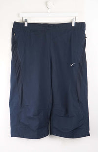 VINTAGE NIKE 3/4 TRACK PANT SHORTS (XL)