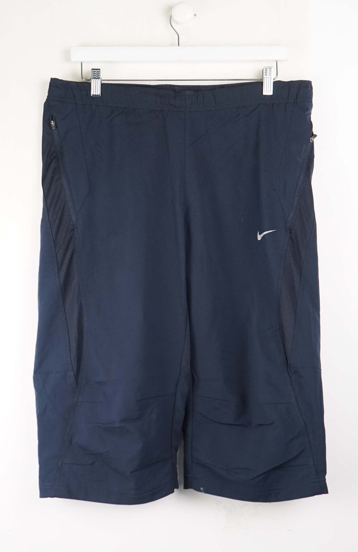 VINTAGE NIKE 3/4 TRACK PANT SHORTS (XL)