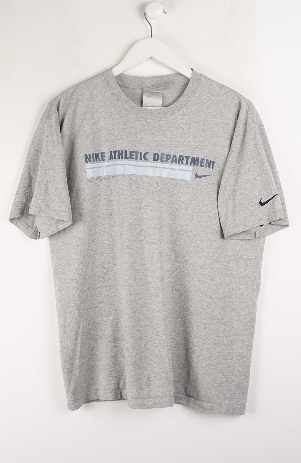 Gray t-shirt with 'Nike Athletic Department' text on a white background