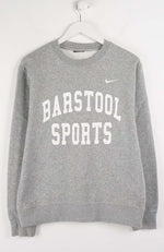 Gray sweatshirt with 'Barstool Sports' text and Nike logo on a white background