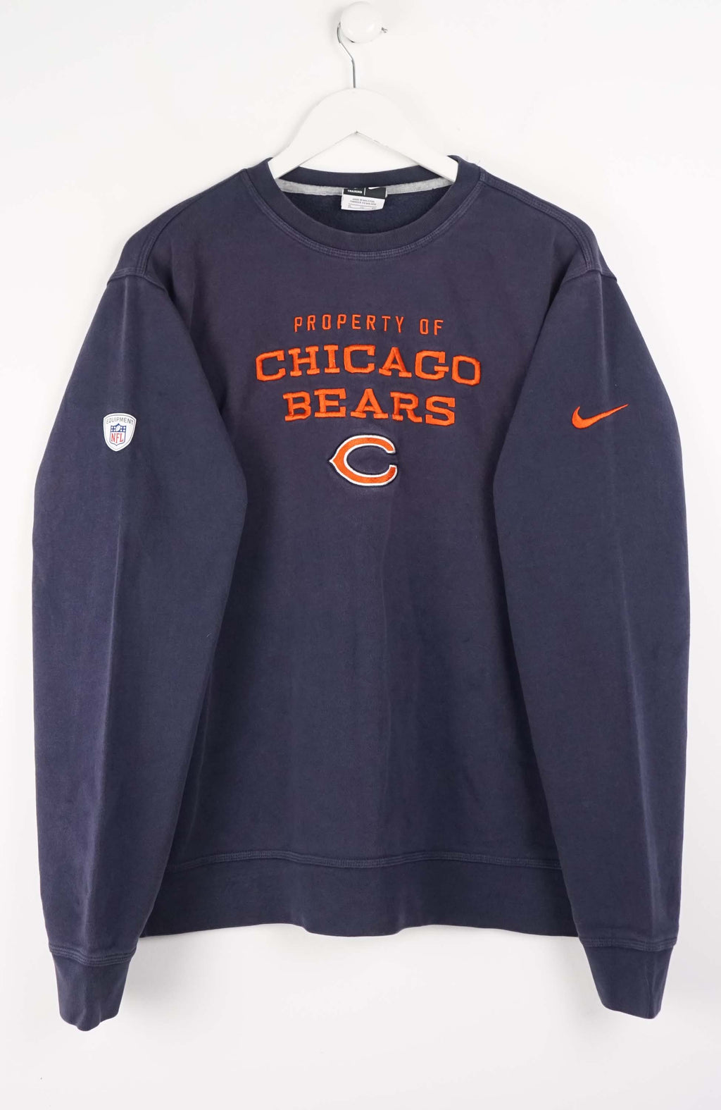 Navy blue sweatshirt with 'Chicago Bears' text and logos on a white background