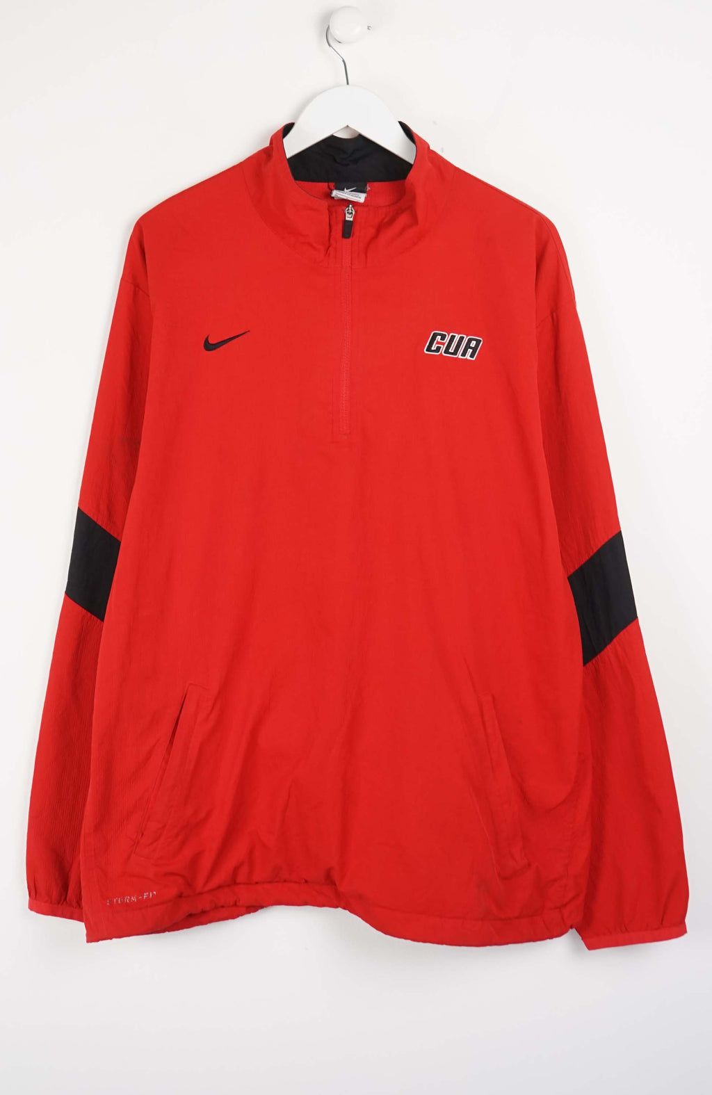 Red sports jacket with black sleeves and logos on a white background