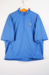 Blue jacket with Nike logo on a white background