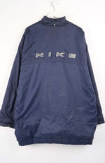 Navy blue Nike jacket on a white background
