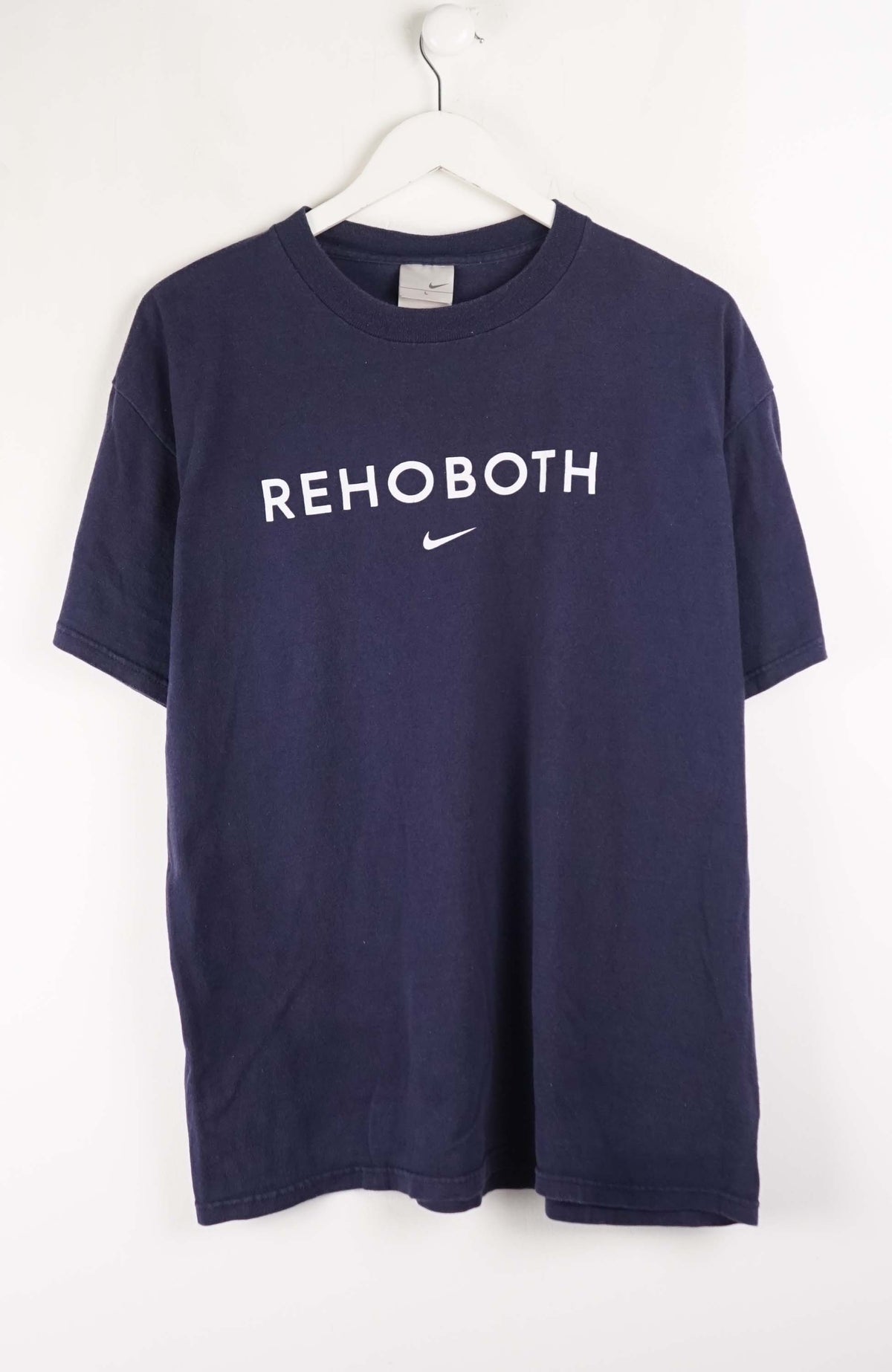Navy blue t-shirt with 'REHOBOTH' text on a white background