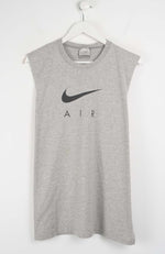 Gray sleeveless Nike shirt with black logo on a white background