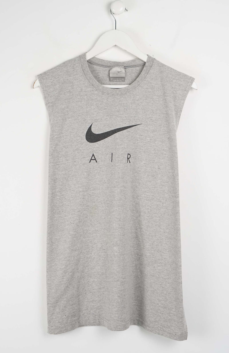 Gray sleeveless Nike shirt with black logo on a white background