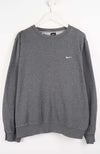 Gray sweatshirt with a Nike logo on a white background