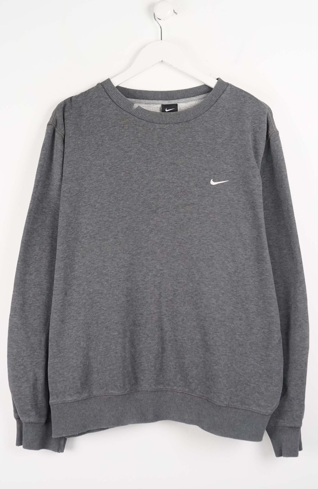 Gray sweatshirt with a Nike logo on a white background