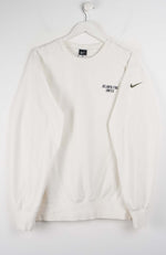 White sweatshirt with Nike logo on a hanger against a white background