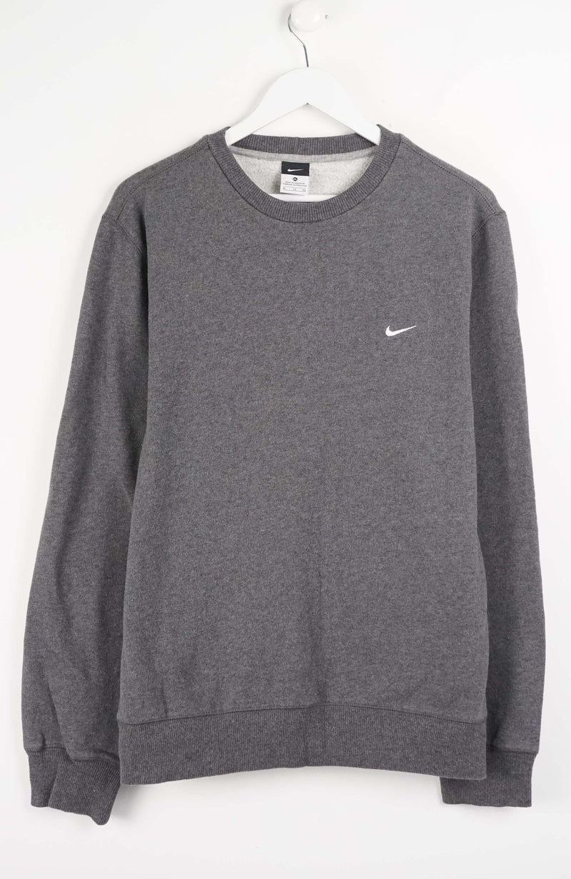 Gray sweatshirt with a small logo on a white background