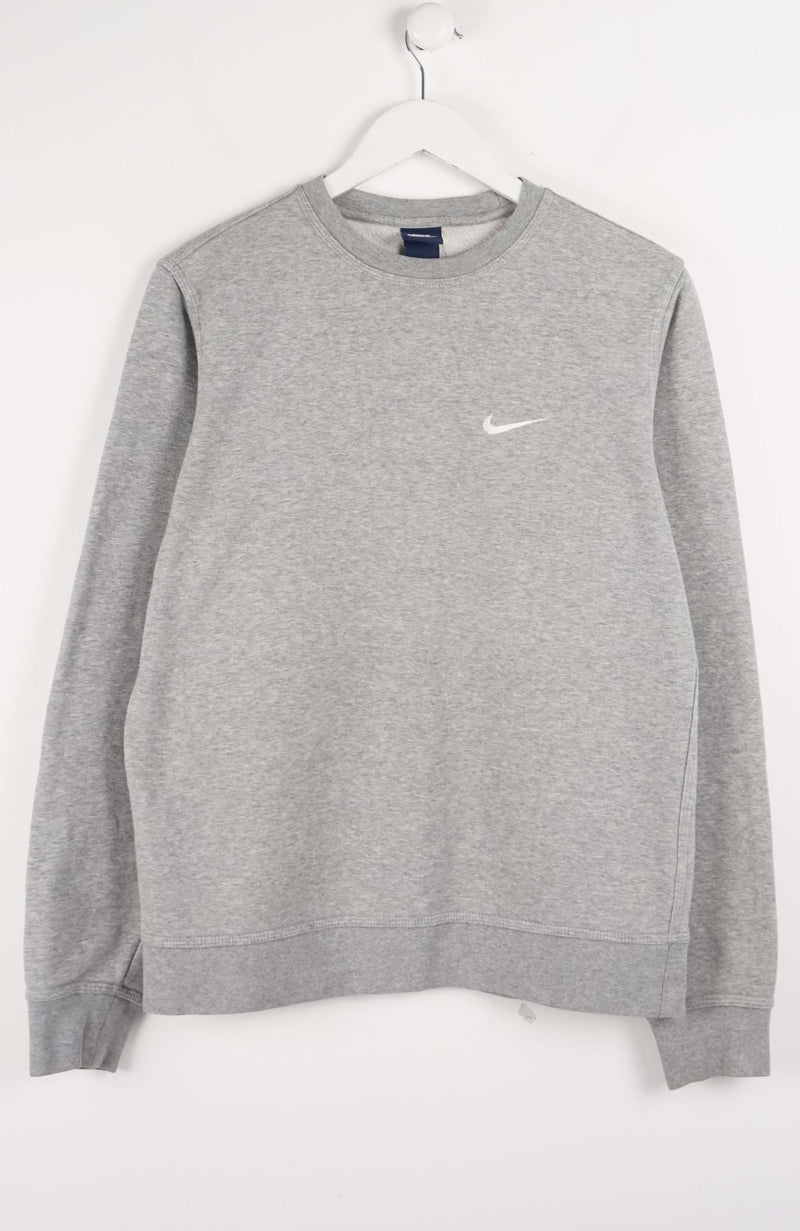Gray sweatshirt with a Nike logo on a white background
