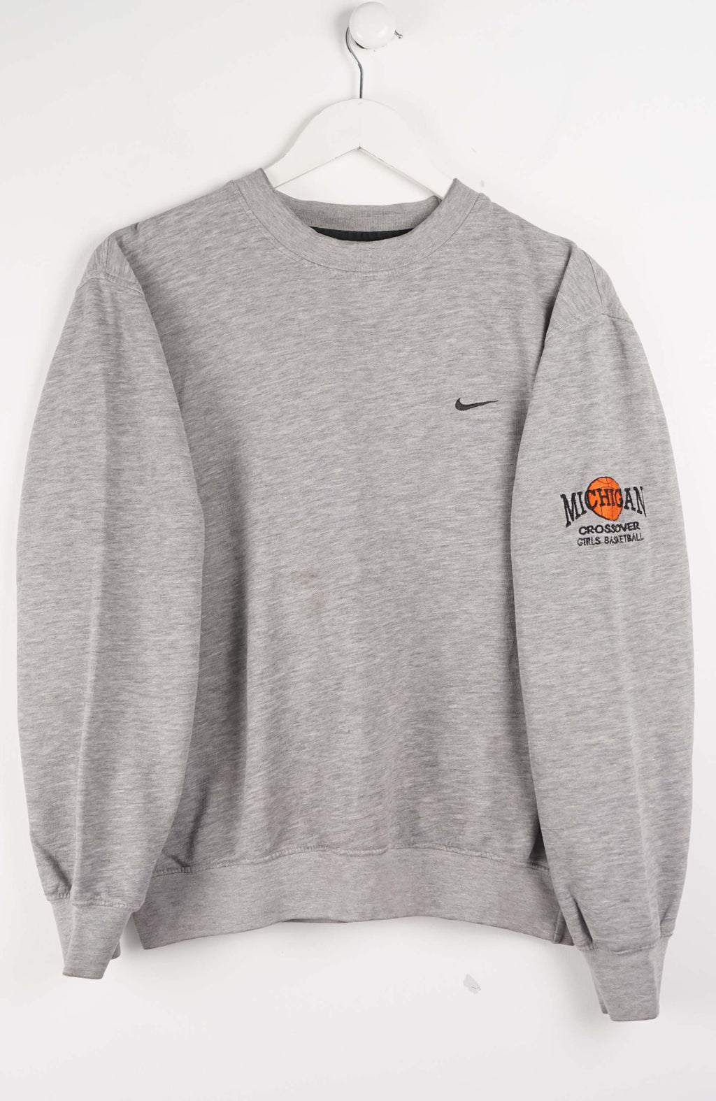 Gray sweatshirt with Nike logo and branding on a white background