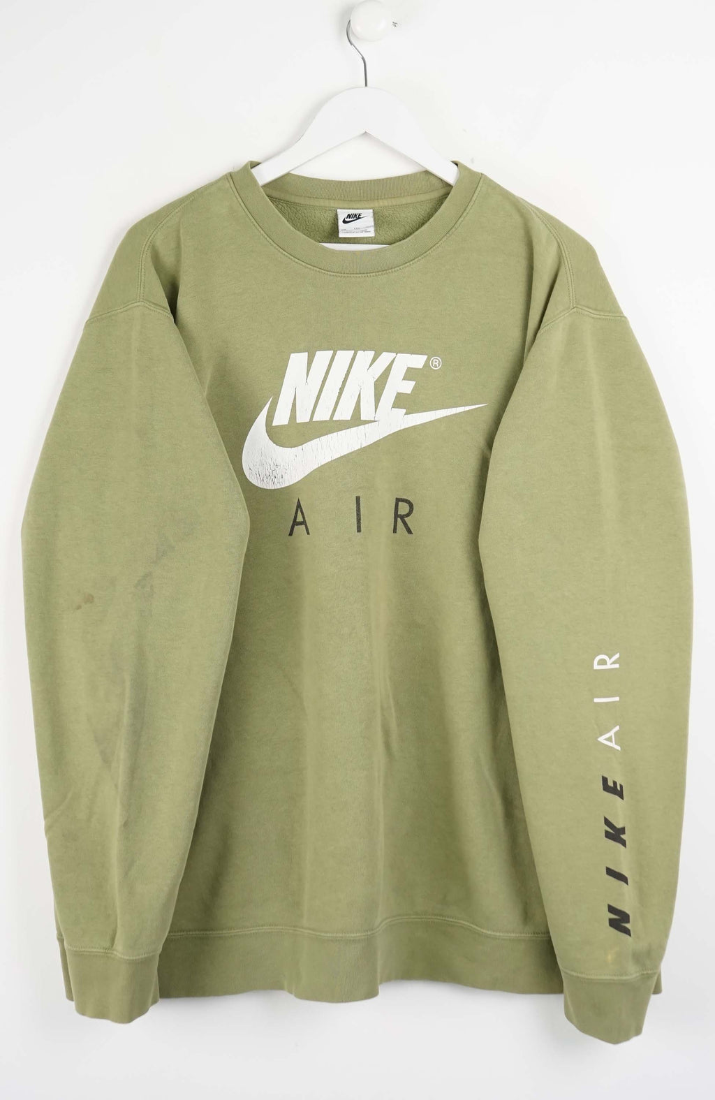 Green Nike sweatshirt with logo on a white background