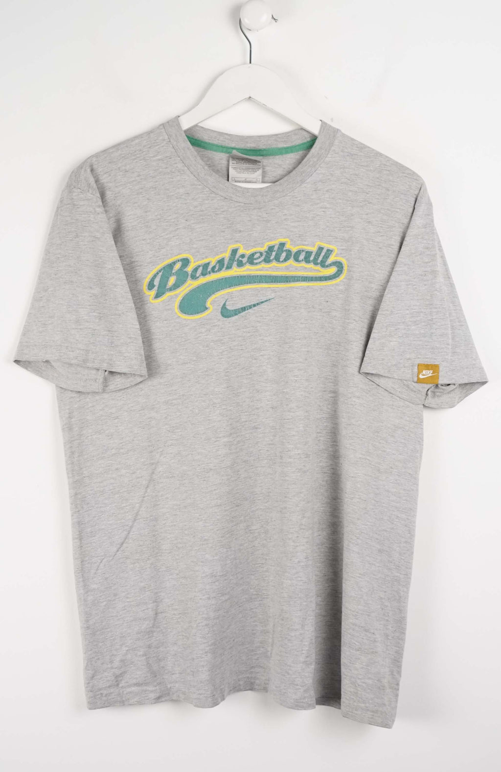 Gray t-shirt with 'Basketball' text and Nike logo on a white background