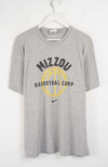 Gray t-shirt with 'Mizzou Basketball Camp' print on a white background