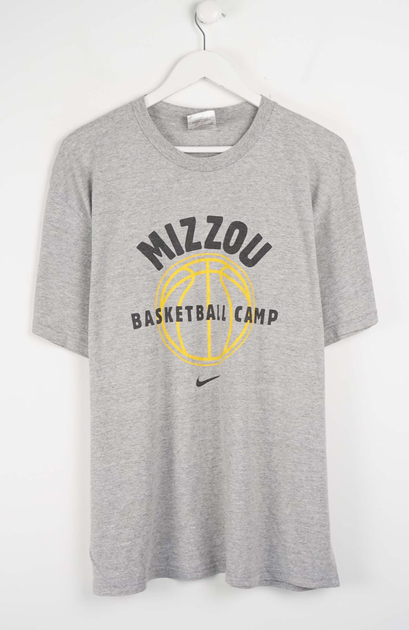 Gray t-shirt with 'Mizzou Basketball Camp' print on a white background
