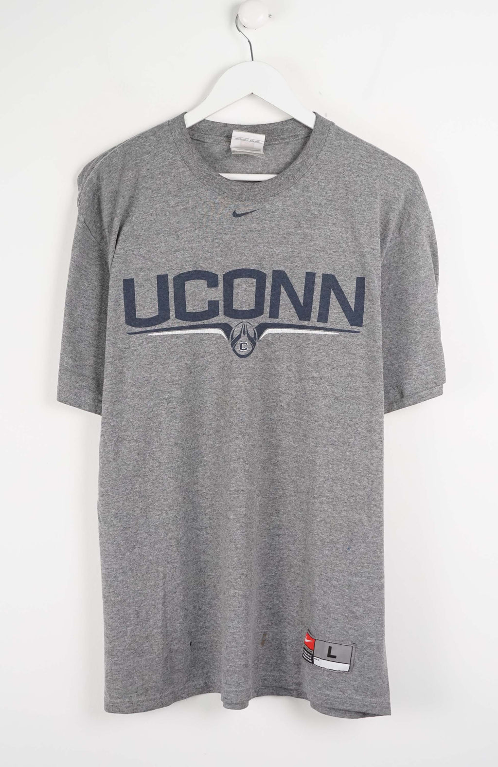 Gray t-shirt with 'UCONN' text on a white background