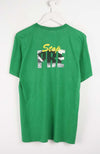 Green t-shirt with 'Stop Pre' text on a white background