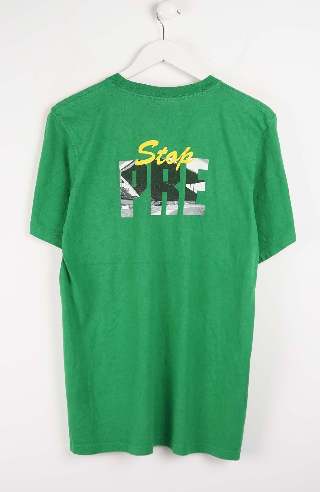 Green t-shirt with 'Hayward Field' text on a white background