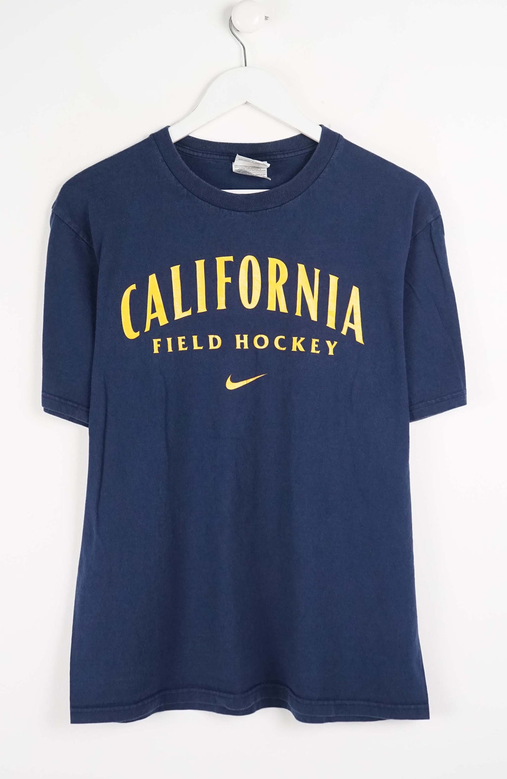 Navy blue t-shirt with 'California Field Hockey' text on a white background
