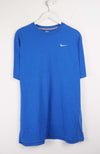 Blue Nike t-shirt on a white hanger against a white background