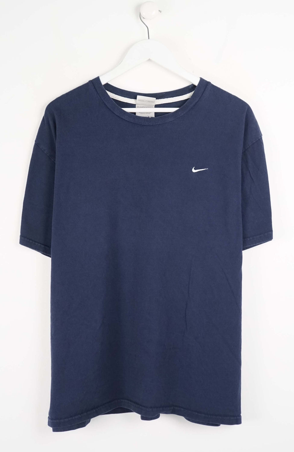 Navy blue t-shirt with Nike logo on a white background