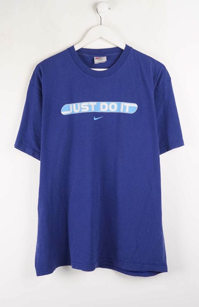 Blue t-shirt with 'Just Do It' text on a white background