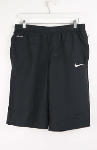 VINTAGE NIKE TRACK PANT SHORTS (L)