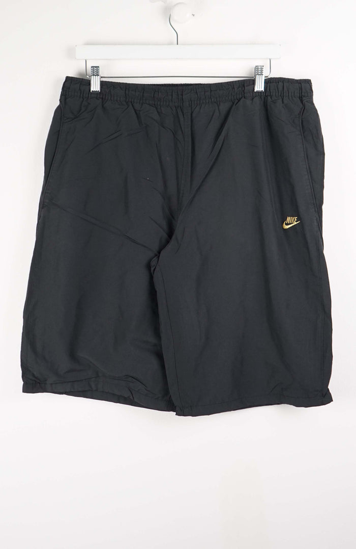 VINTAGE NIKE TRACK PANT SHORTS (XL)
