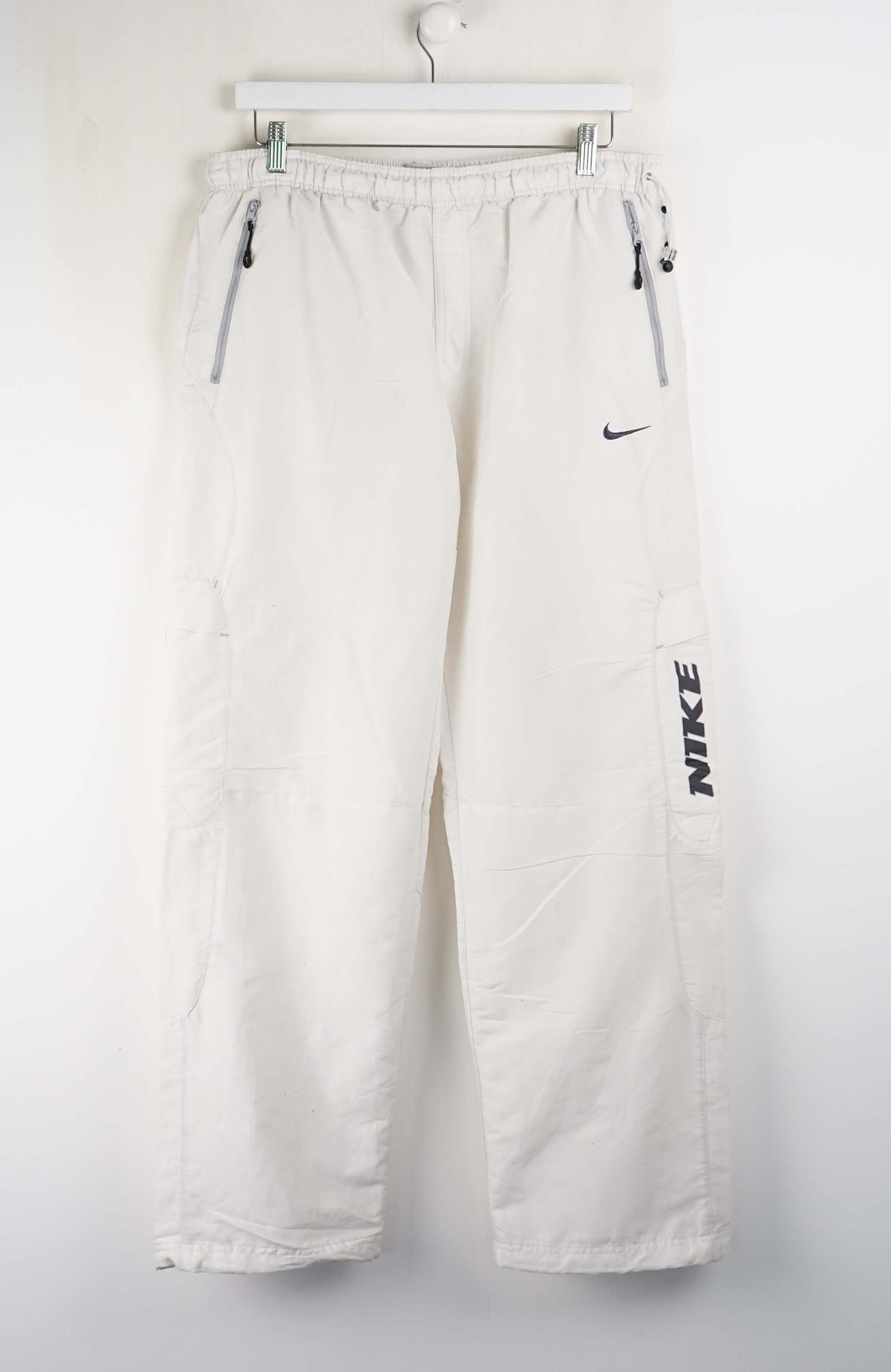 White Nike pants on a white background