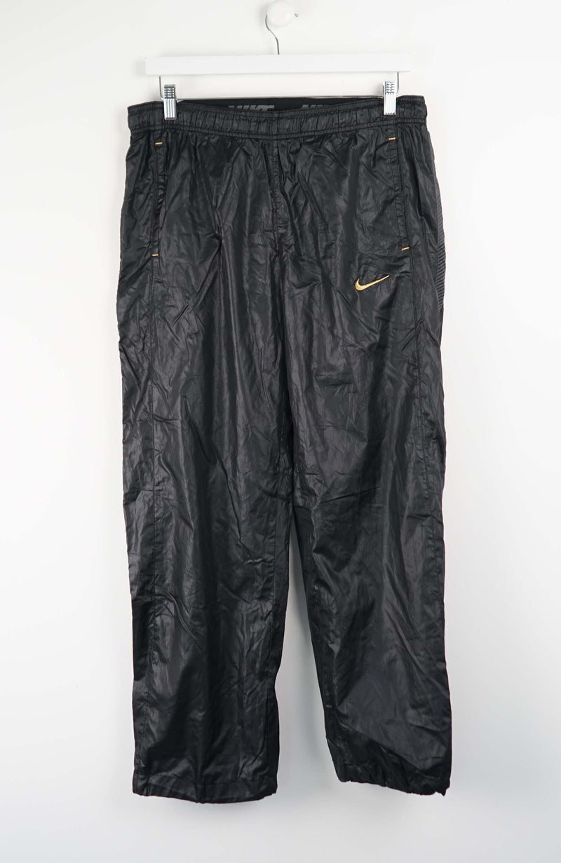 VINTAGE NIKE TRACK PANTS (M)