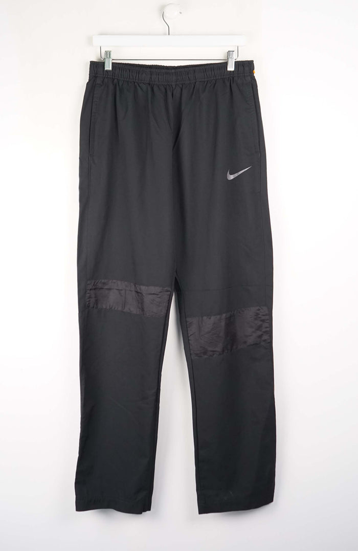 VINTAGE NIKE TRACK PANTS (M)