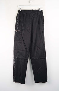 Black pants with white text on a white background