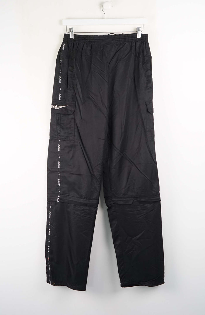 Black pants with white text on a white background