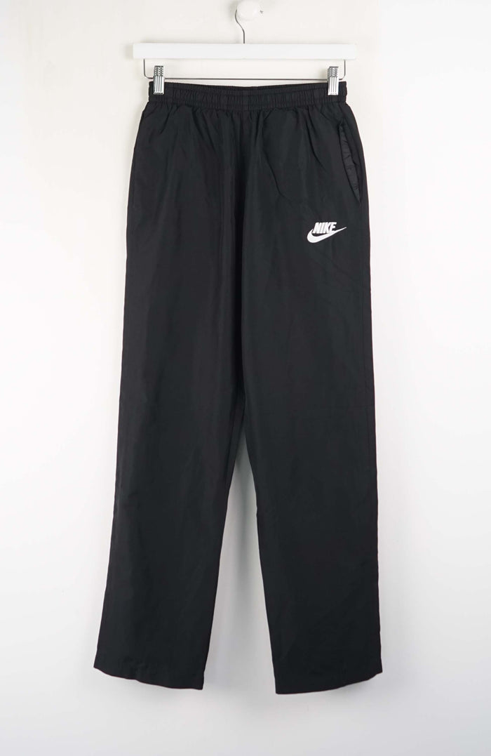 Black pants with a white logo on a white background