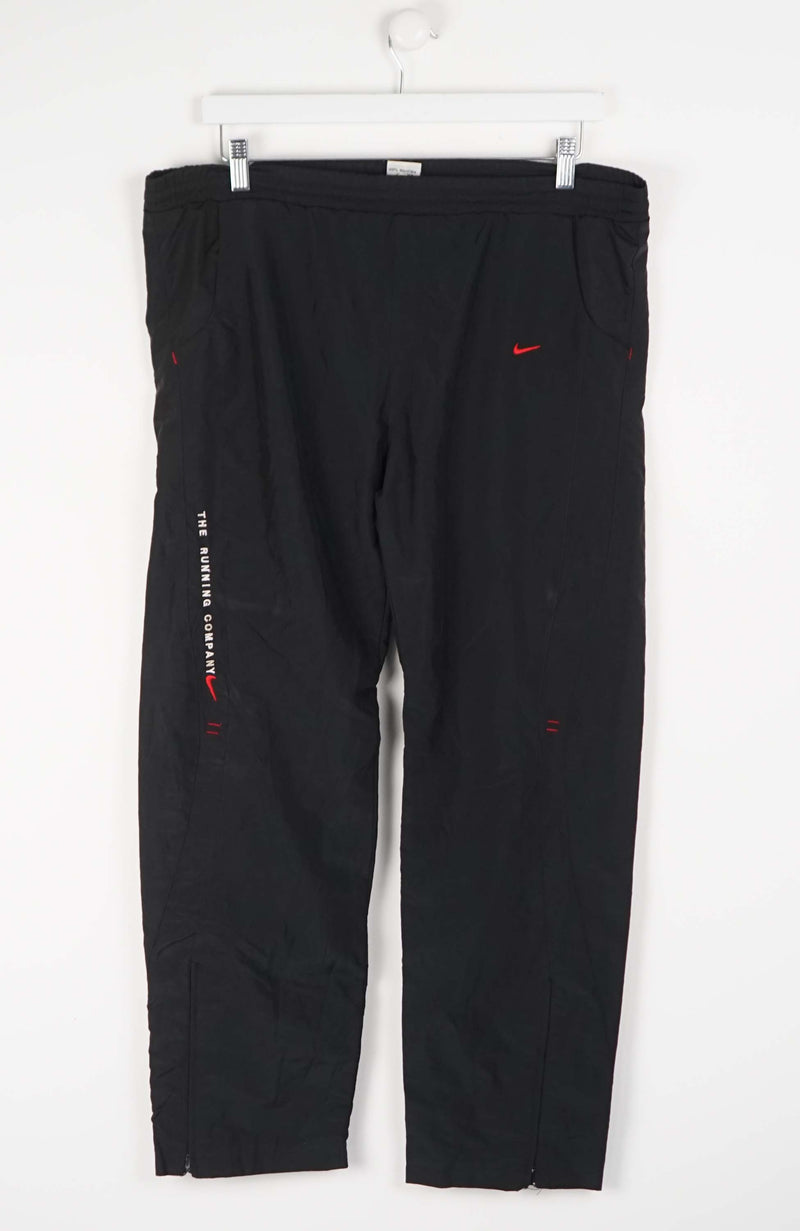 VINTAGE NIKE TRACK PANTS (XL)
