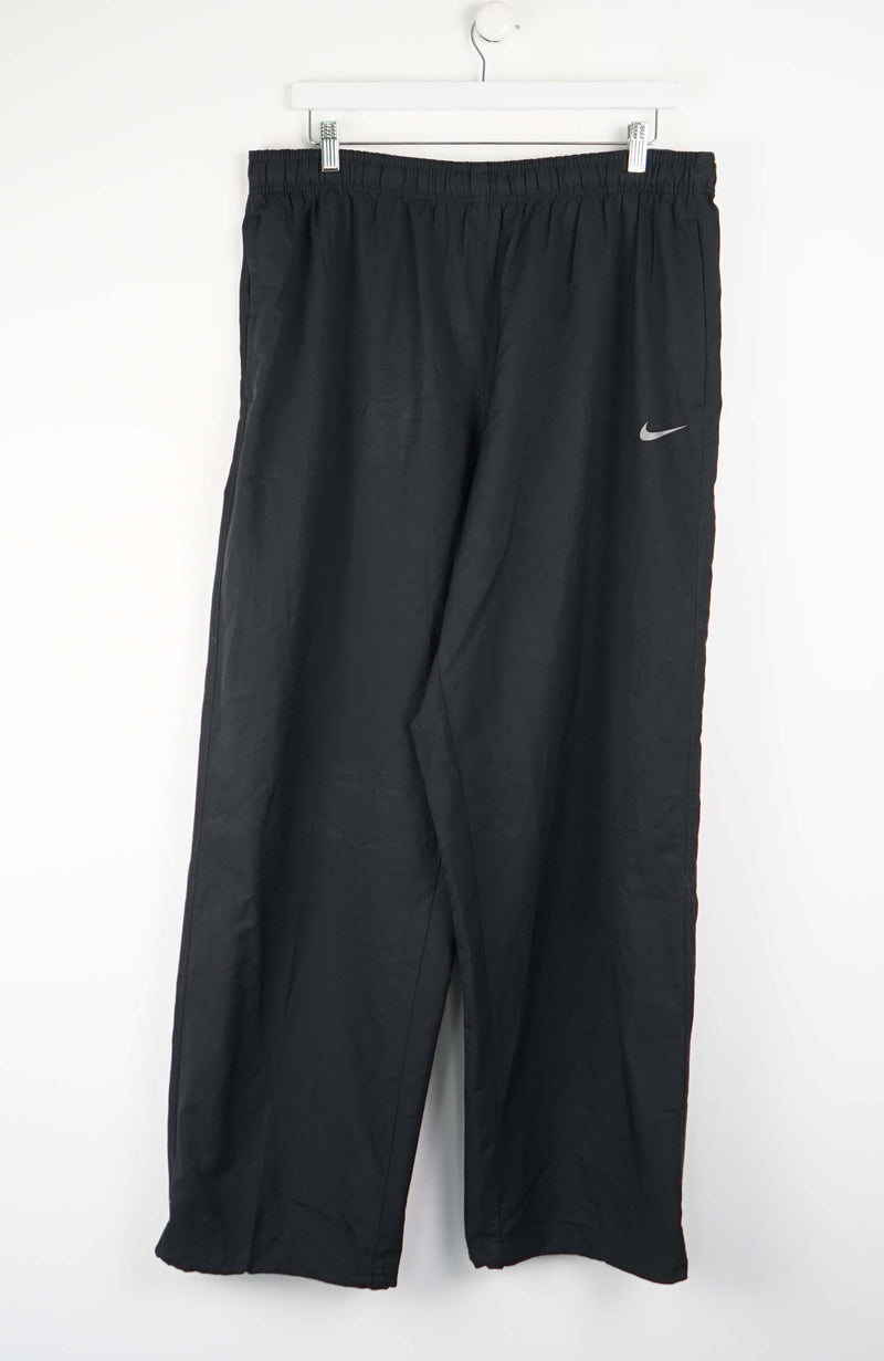 VINTAGE NIKE TRACK PANTS (XL)