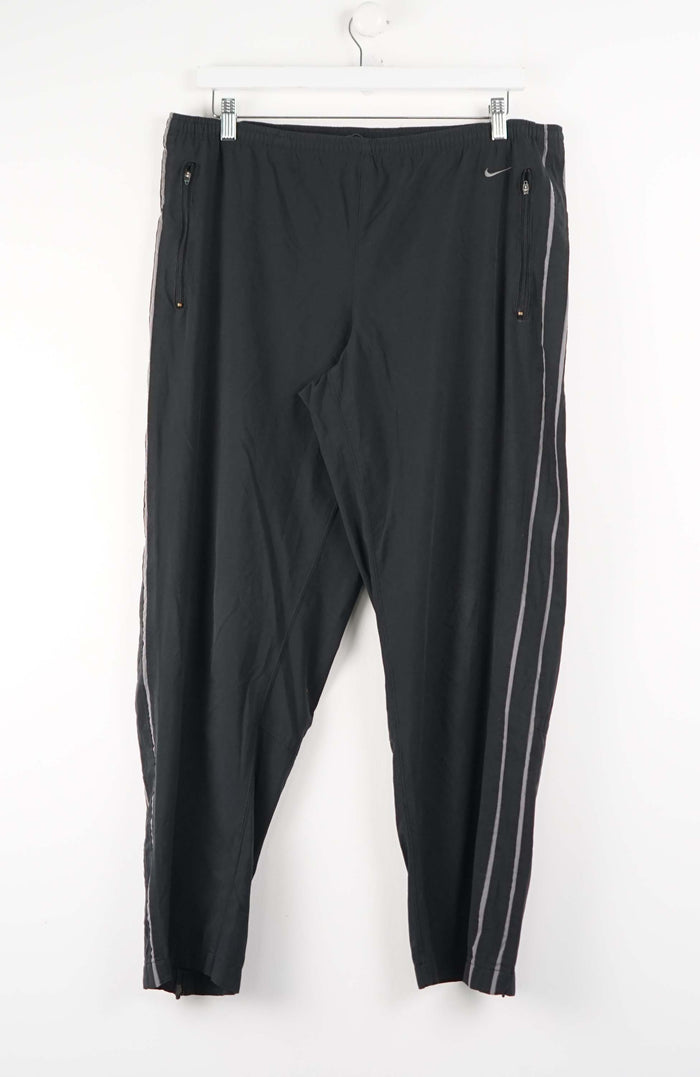 VINTAGE NIKE TRACK PANTS (XL)