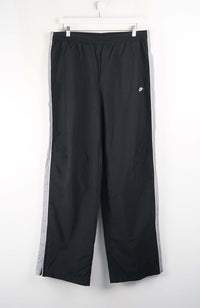 Black pants with a white logo on a white background