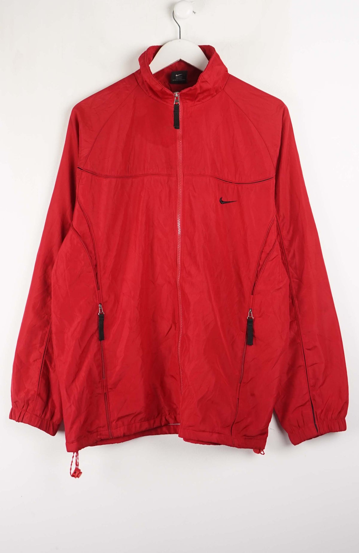 Red jacket with a brand logo on a white background