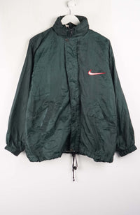 Green jacket with a red Nike logo on a white background