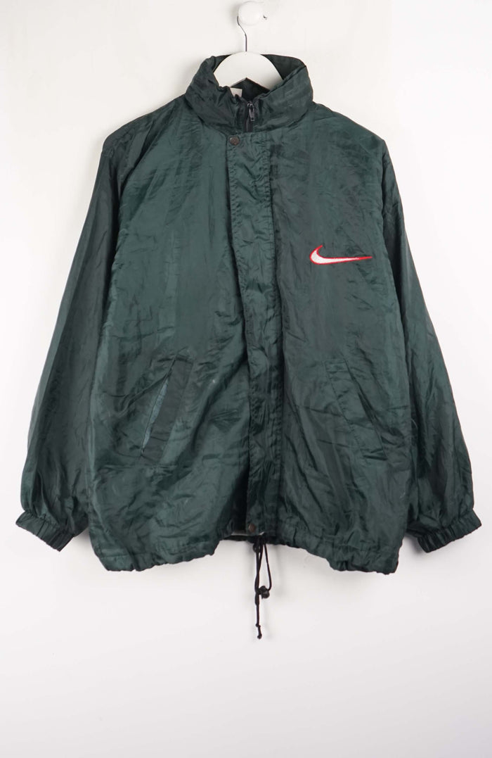 Green jacket with a red Nike logo on a white background