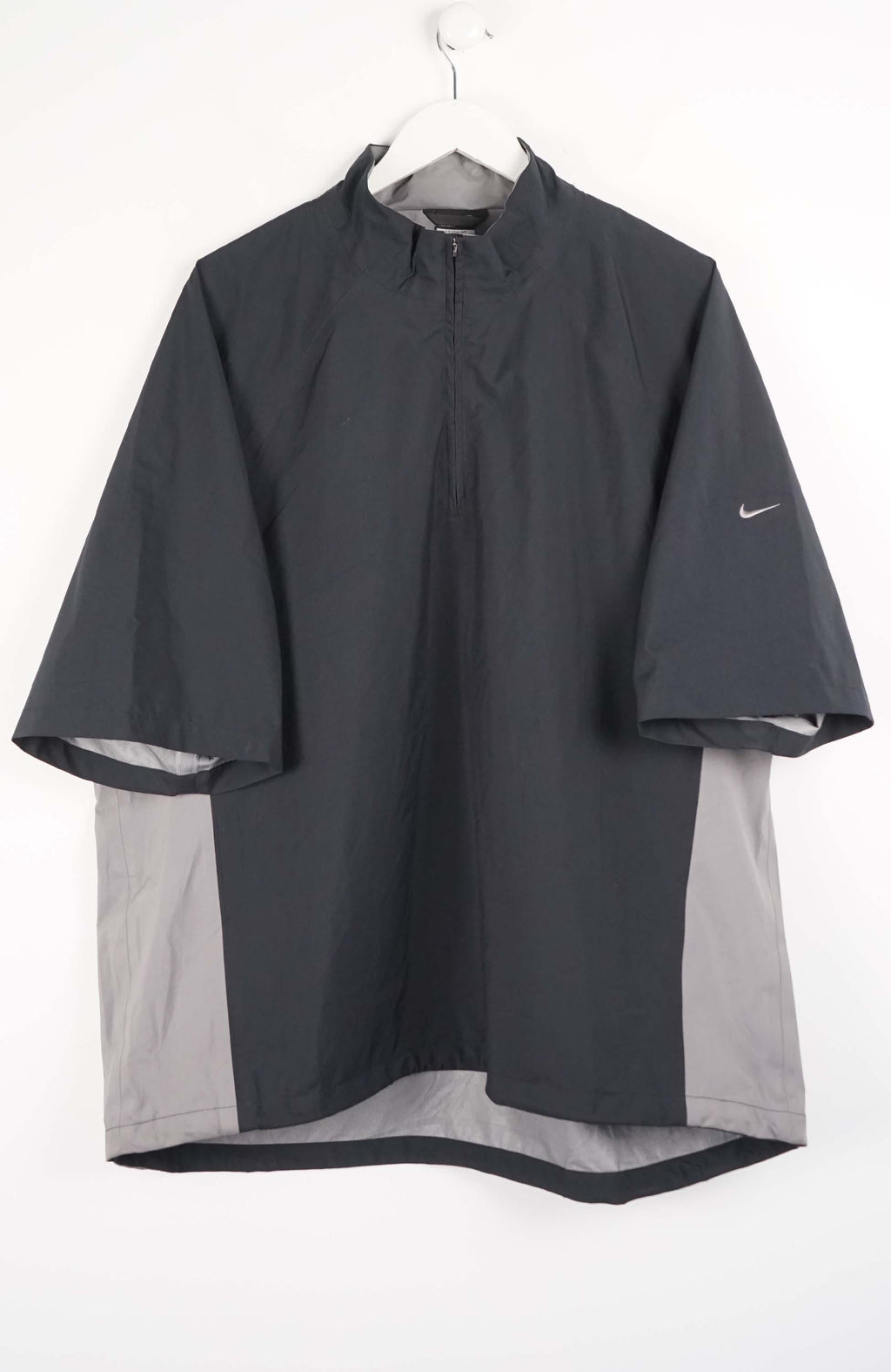 Dark gray raincoat with Nike logo on a white background