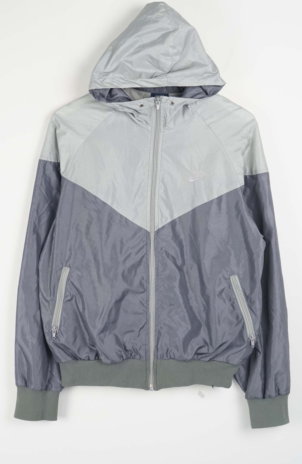 Gray and light blue jacket with a hood on a white background