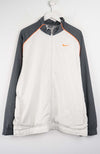 Gray and white jacket with Nike logo on a white background