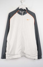Gray and white jacket with Nike logo on a white background