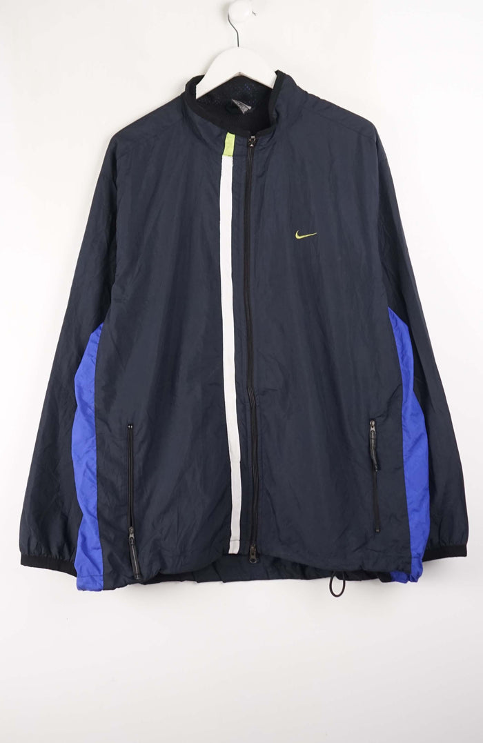 Black jacket with blue accents and Nike logo on a white background